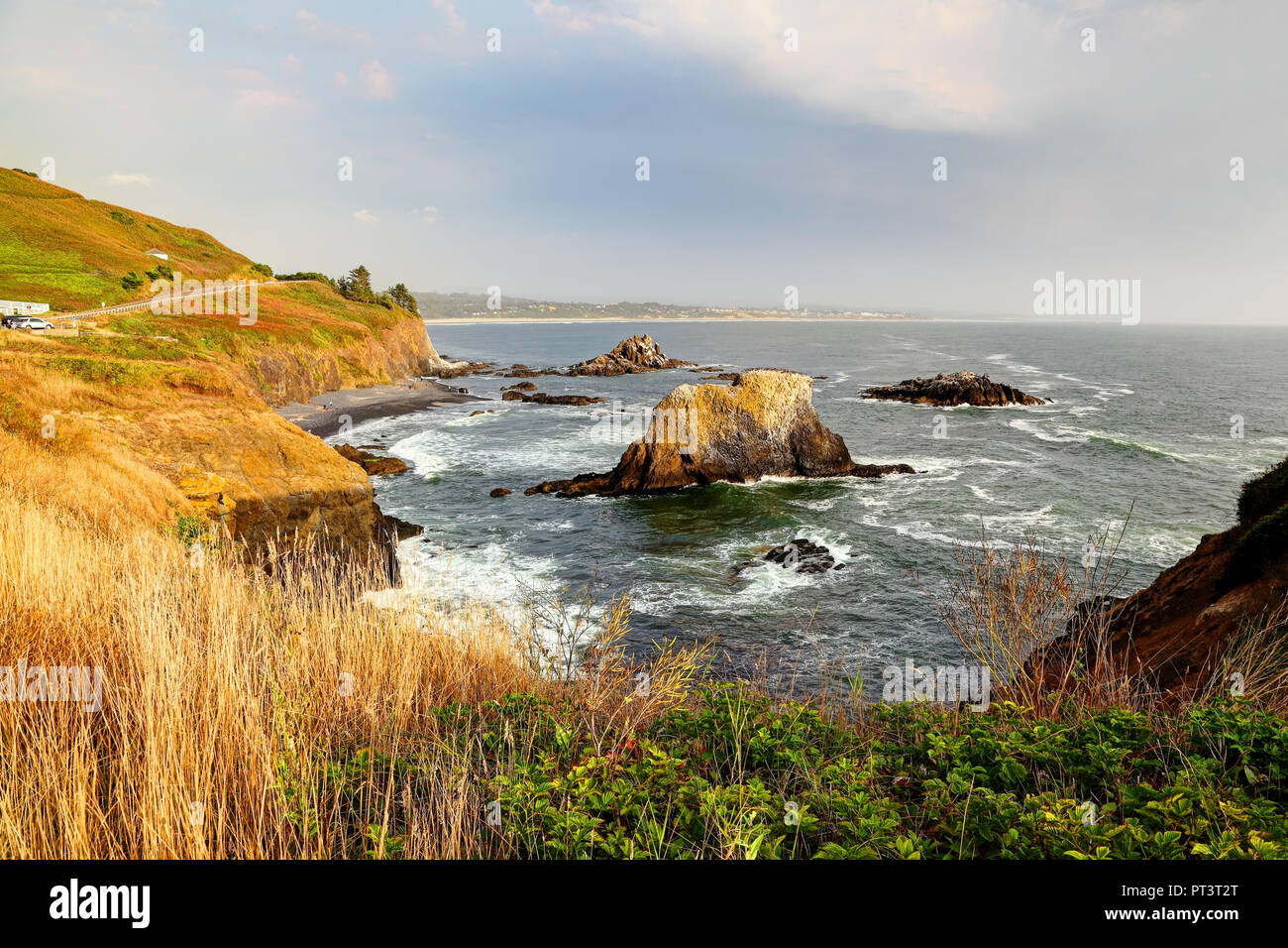 Entlang der Küste von Oregon: Yaquina Head hervorragende natürliche Umgebung - cobble Strand Stockfoto