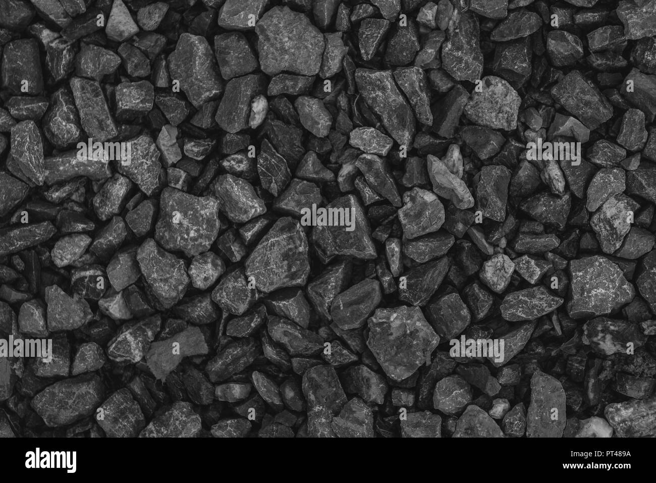 Schwarzer Kies Hintergrund Stockfoto