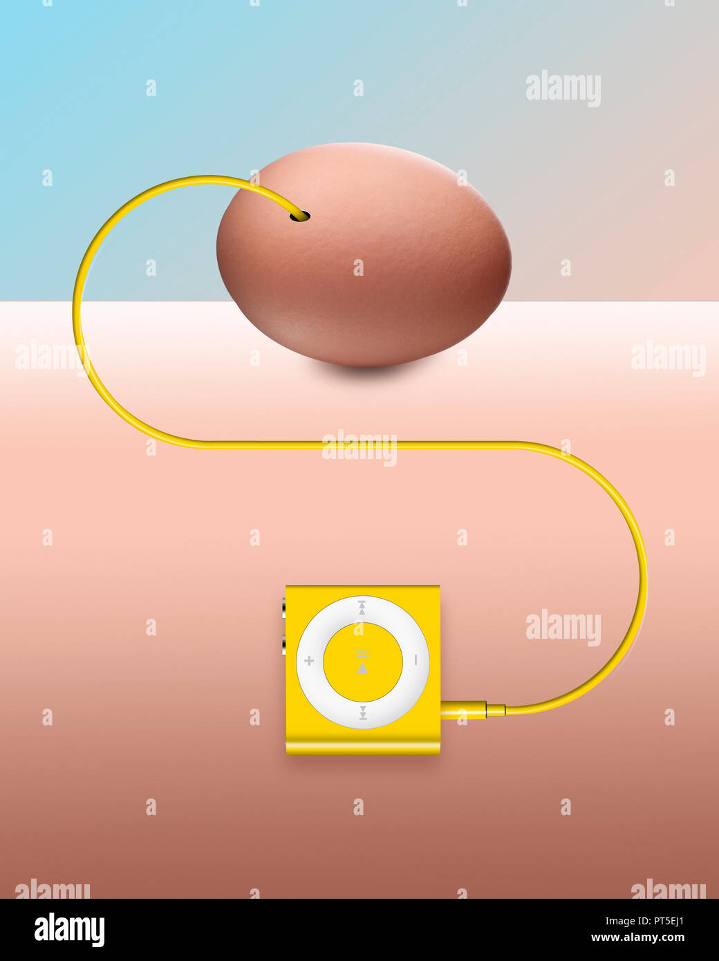 Konzept eines Fötus befruchteten Eies Hören von Musik aus einer Apple iPod Mini, verdrahtet und angeschlossen Stockfoto