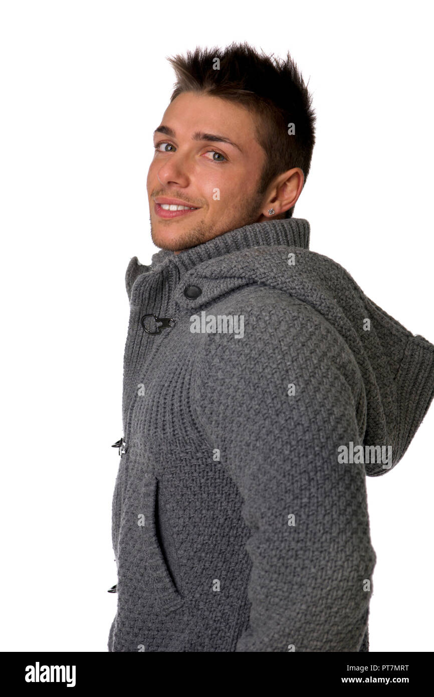 Gut aussehender junger Mann, der Winter hoodie Pullover Stockfoto