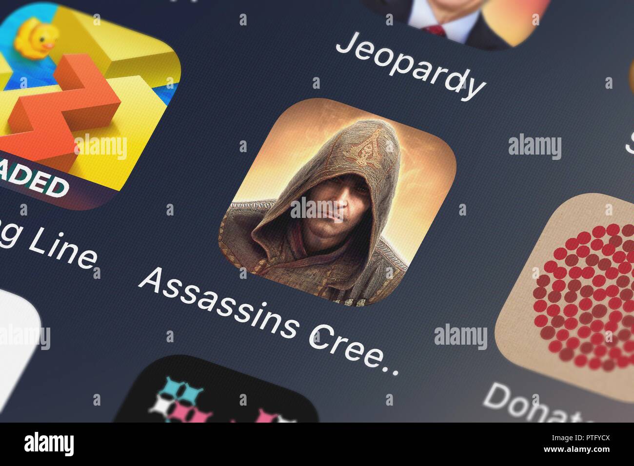 London, Großbritannien - 09.Oktober 2018: Symbol der mobile App Assassin's Creed Identität von Ubisoft auf einem iPhone. Stockfoto