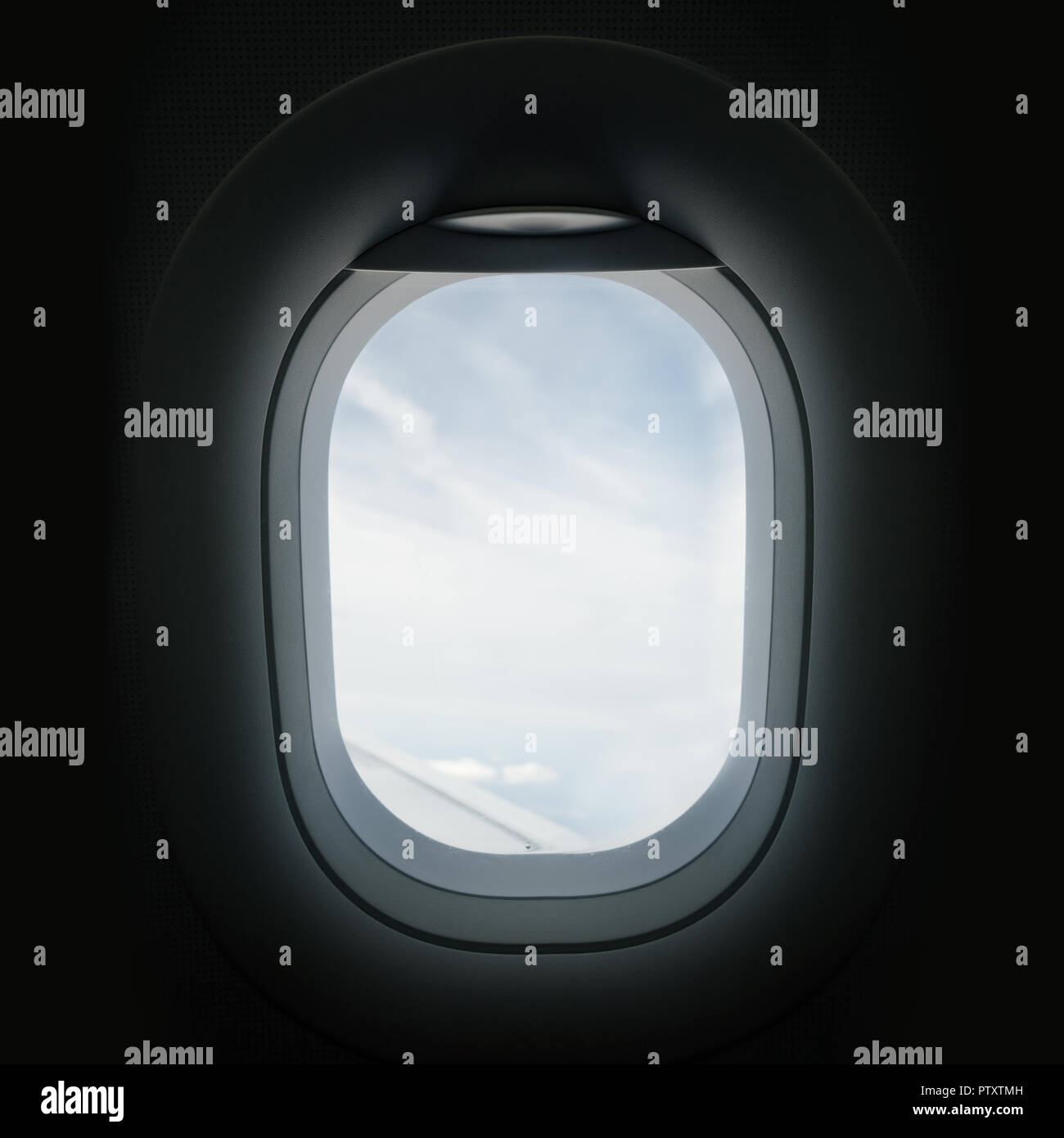 Auf der Suche durch eine Flugzeuge bullauge Fenster während eines Fluges. Stockfoto