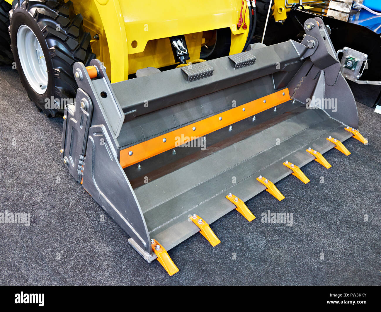 Eimer neue Mini Loader auf dem Messegelände Stockfoto