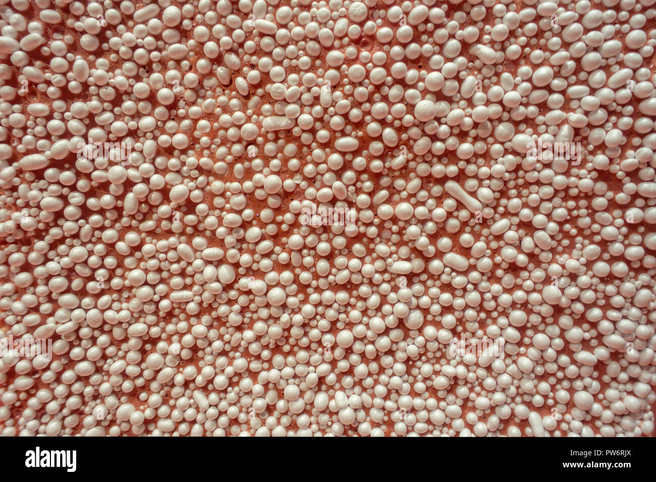 Mann aus Material mit weißen bumbs und tan Hintergrund zusammen geklebt und eine raue Oberfläche zu machen Stockfoto