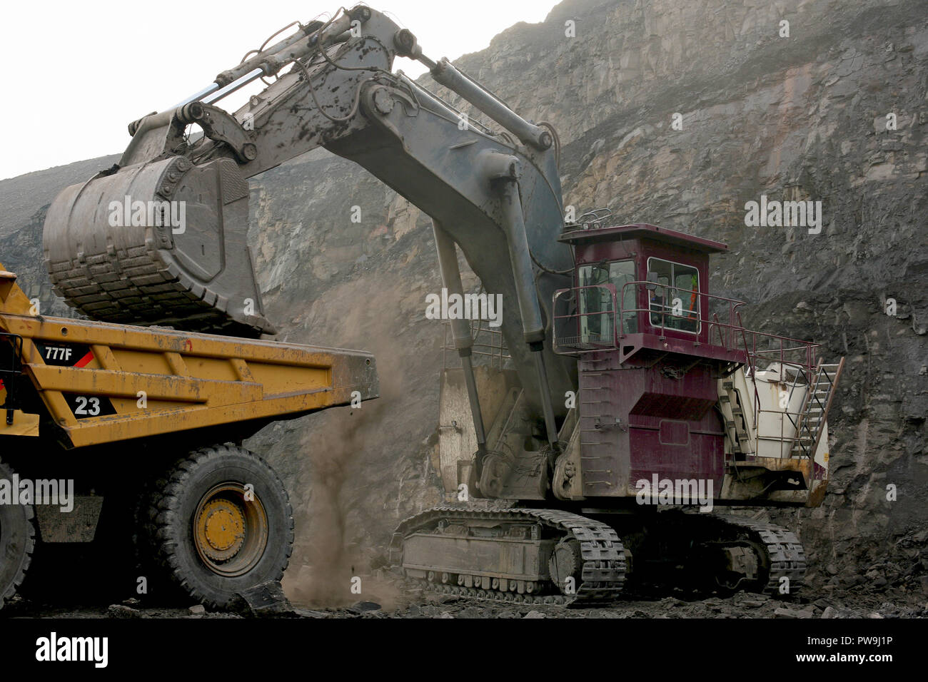 Ein Caterpillar 6030 Hydraulische Gesicht schaufeln und Baggern arbeiten in Tower Colliery, South Wales Stockfoto