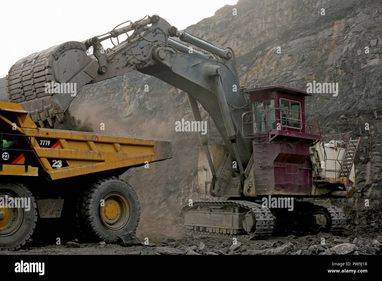 Ein Caterpillar 6030 Hydraulische Gesicht schaufeln und Baggern arbeiten in Tower Colliery, South Wales Stockfoto