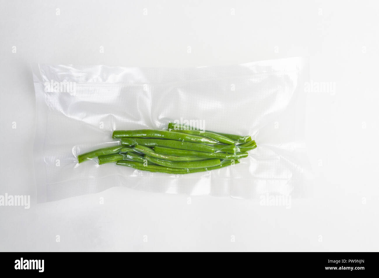 Vakuumdicht frische grüne Bohnen Stockfoto
