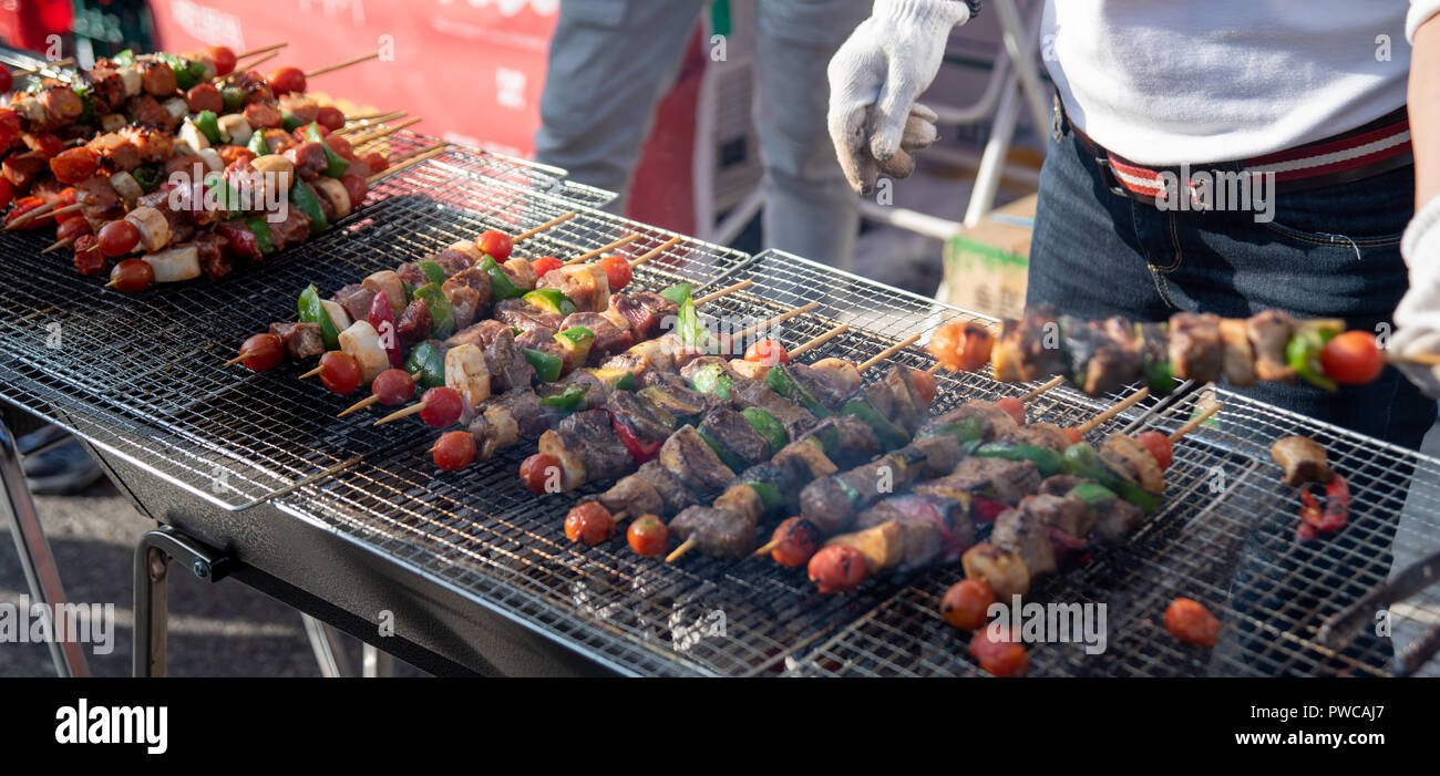 Essen gebacken mit Stöcken, Seoul Street Food, Korea. Stockfoto