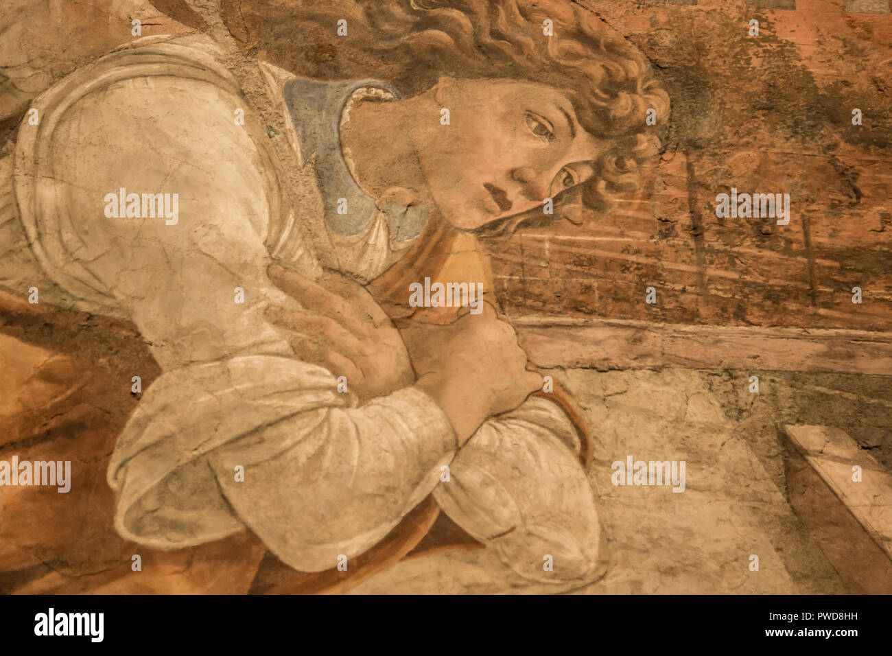 Eine Nahaufnahme des Gesichts des Engel in Boltticelli der Verkündigung in den Uffizien in Florenz, Italien. Ehemals ein Fresko entfernt wurde und auf Leinwand montiert. Stockfoto