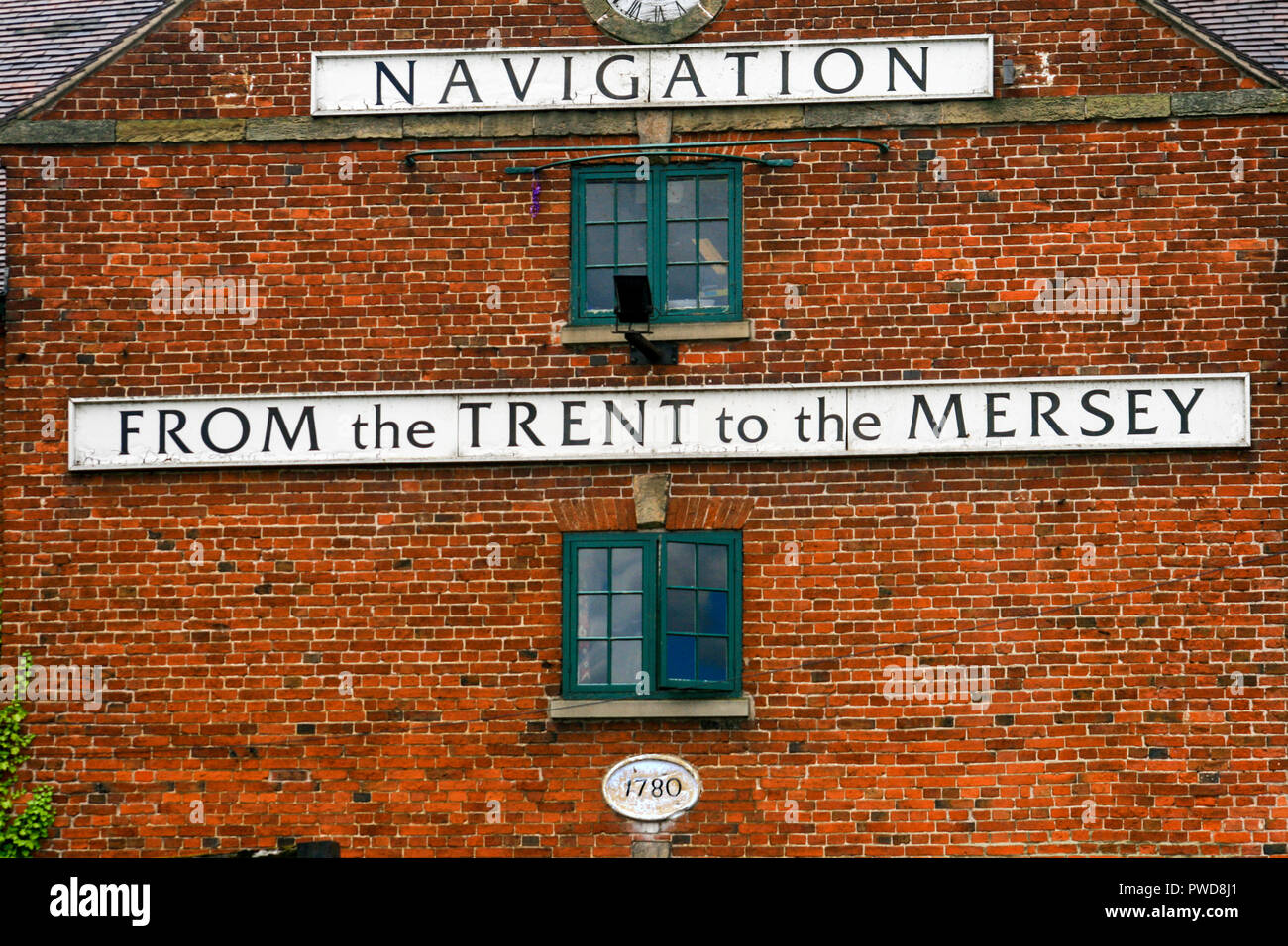 Alte canal Wharf Gebäude markiert den Beginn des Trent und Mersey canal Navigation in Shardlow marina Derbyshire England Großbritannien Stockfoto