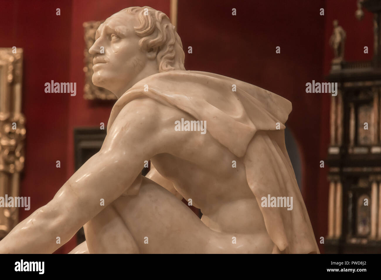 Die Arrotino, aka der Messerschleifer oder der Sythian, Marmor Skulptur in der Tribuna Zimmer in den Uffizien in Florenz, Italien. Stockfoto