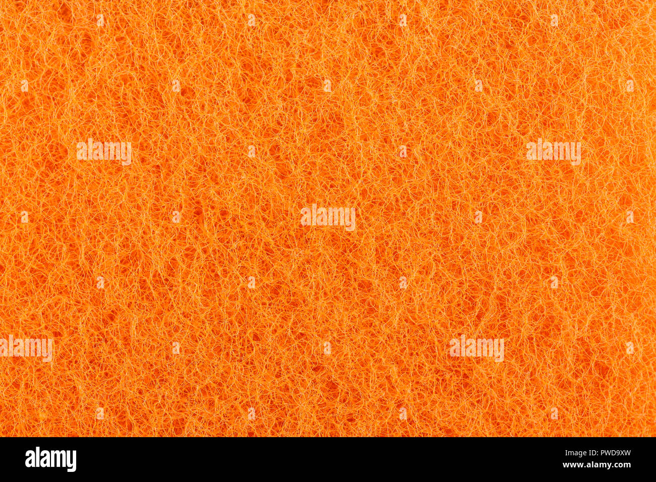 Orange loofah Close-up Platz für Text. Zubehör für die Reinigung der Räumlichkeiten Stockfoto