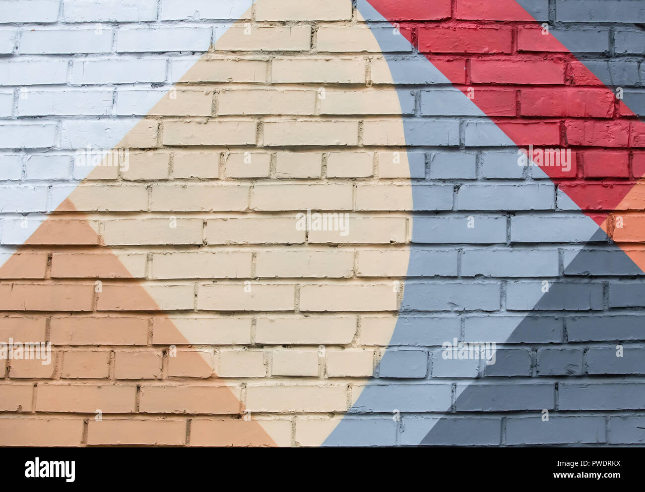 Brick Wall mit einer abstrakten geometrischen Muster. Hintergrund Stockfoto
