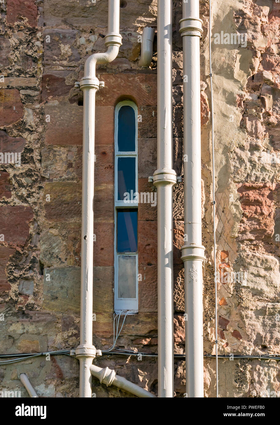 Detail der schrulligen Fenster- und Abflussrohre Dalkeith Palace, Dalkeith Country Park historische Gebäude, jetzt Wisconsin University Campus, Schottland, Großbritannien Stockfoto