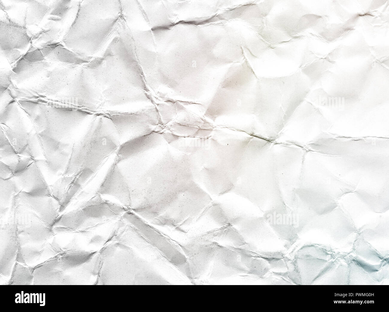 Weiß zerknittertes Papier Textur Hintergrund für abstrakte Konzept Stockfoto