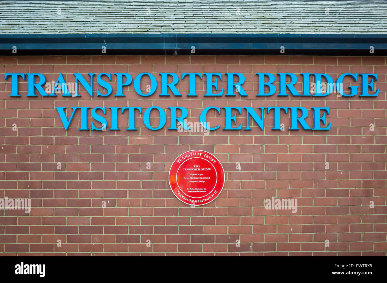 Middlesbrough Transporter Bridge Visitor Center anmelden und eine rote Plakette für einen Transport Weltkulturerbe Stockfoto