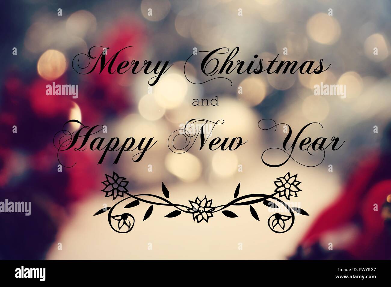 Frohe Weihnachten und guten Rutsch ins Neue Jahr Weihnachtsgrüße auf fancy Font mit unscharfen Hintergrund Stockfoto