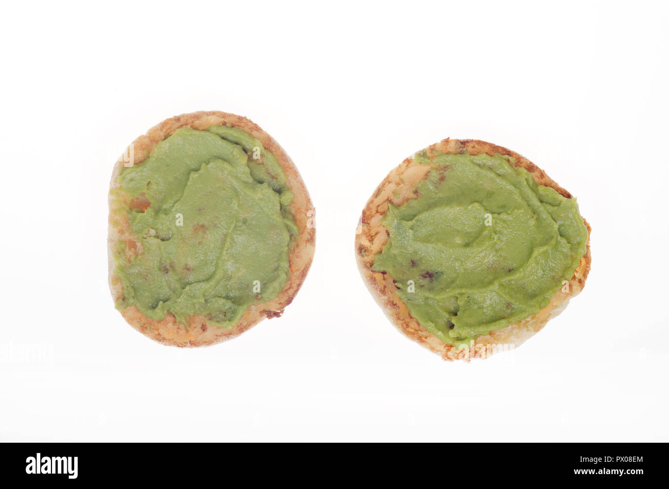 Zertrümmerte avocado auf einem getoasteten English Muffin Stockfoto