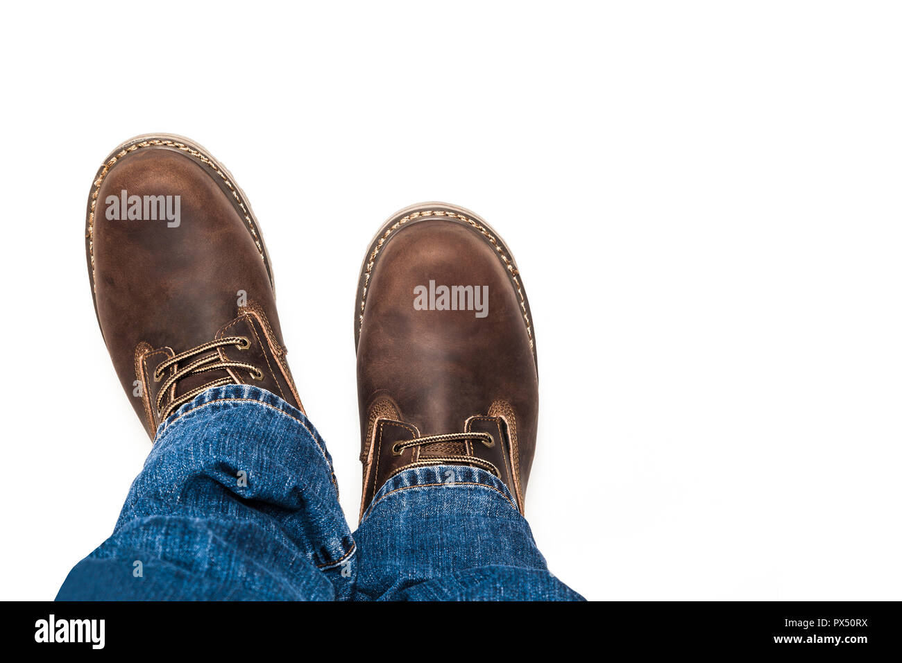 Herren braun Stiefel und Jeans isoliert Stockfoto