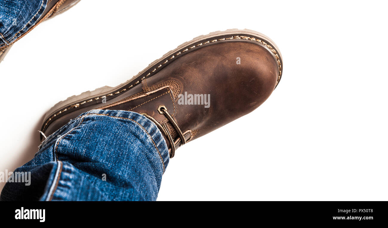 Herren braun Stiefel und Jeans isoliert Stockfoto