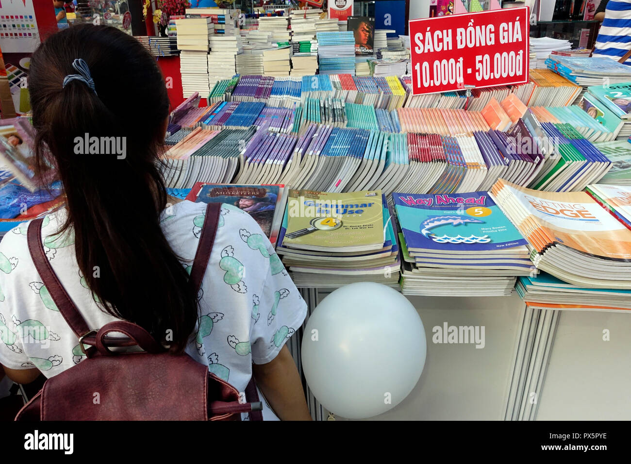 Mädchen im City Buchmesse. Ho Chi Minh City. Vietnam. Stockfoto