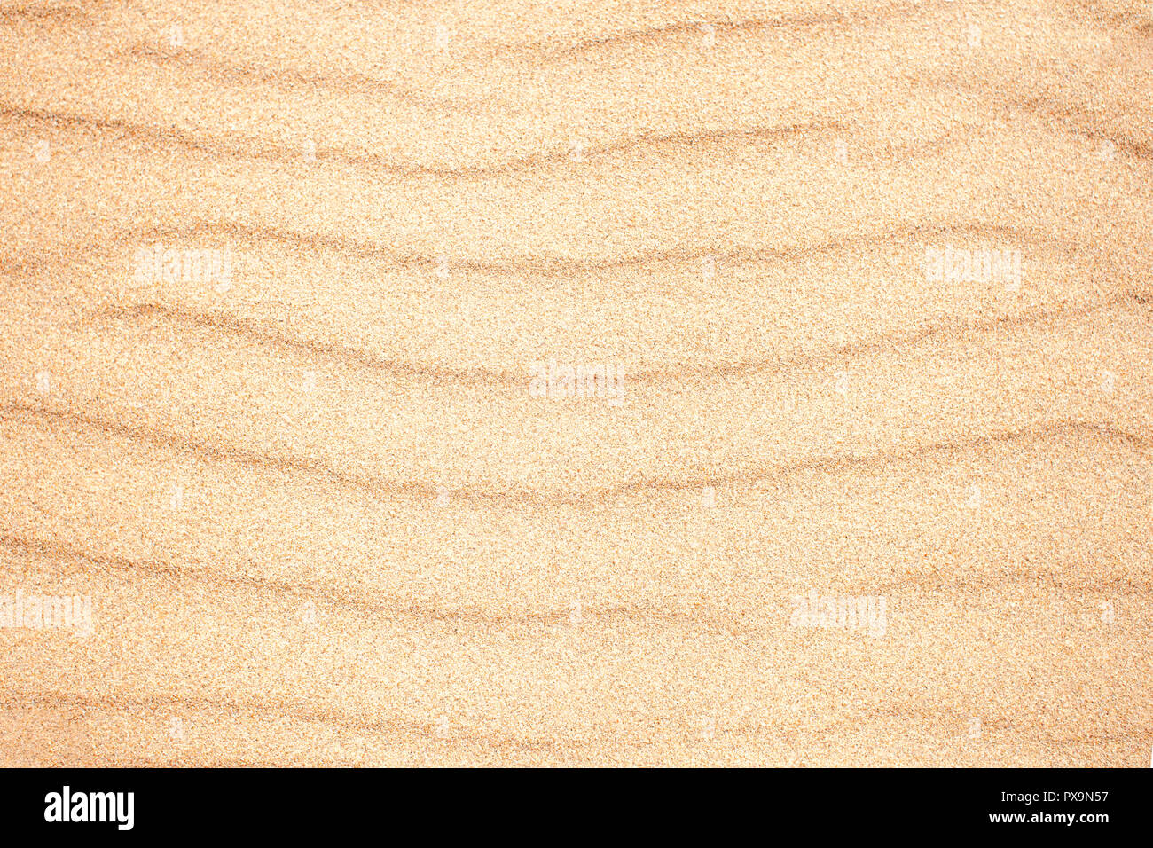 Sand Textur, Sandstrand Hintergrund, touristische Konzept Stockfoto