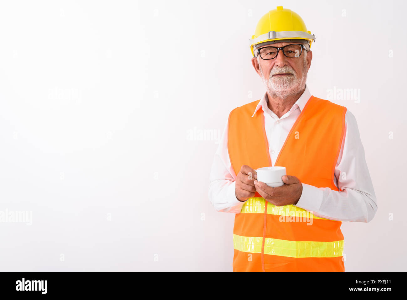 Studio geschossen von Stattlichen älteren bärtigen Mann Bauarbeiter h Stockfoto
