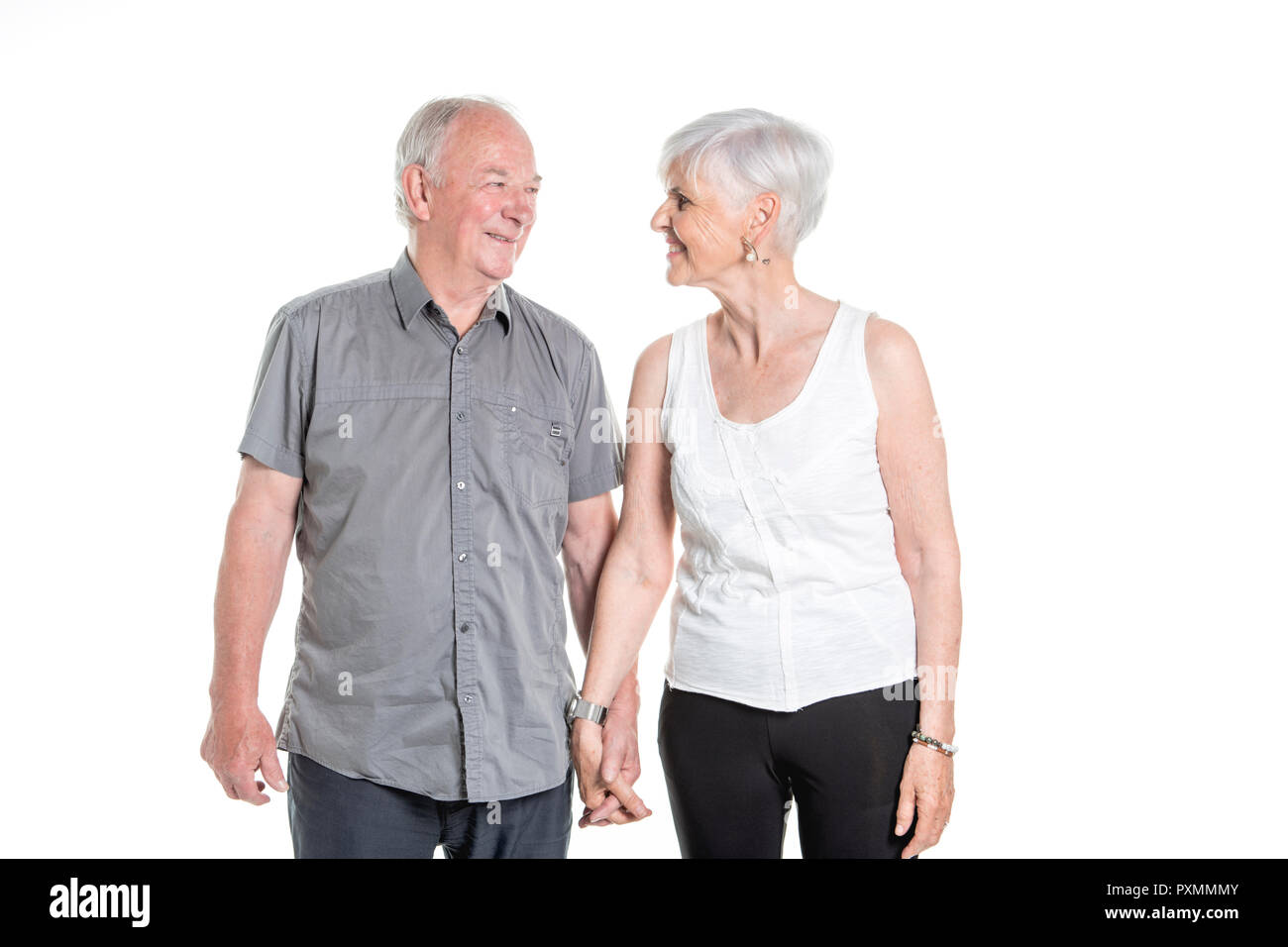 Senior Paar auf Studio weißen Hintergrund posiert Stockfoto