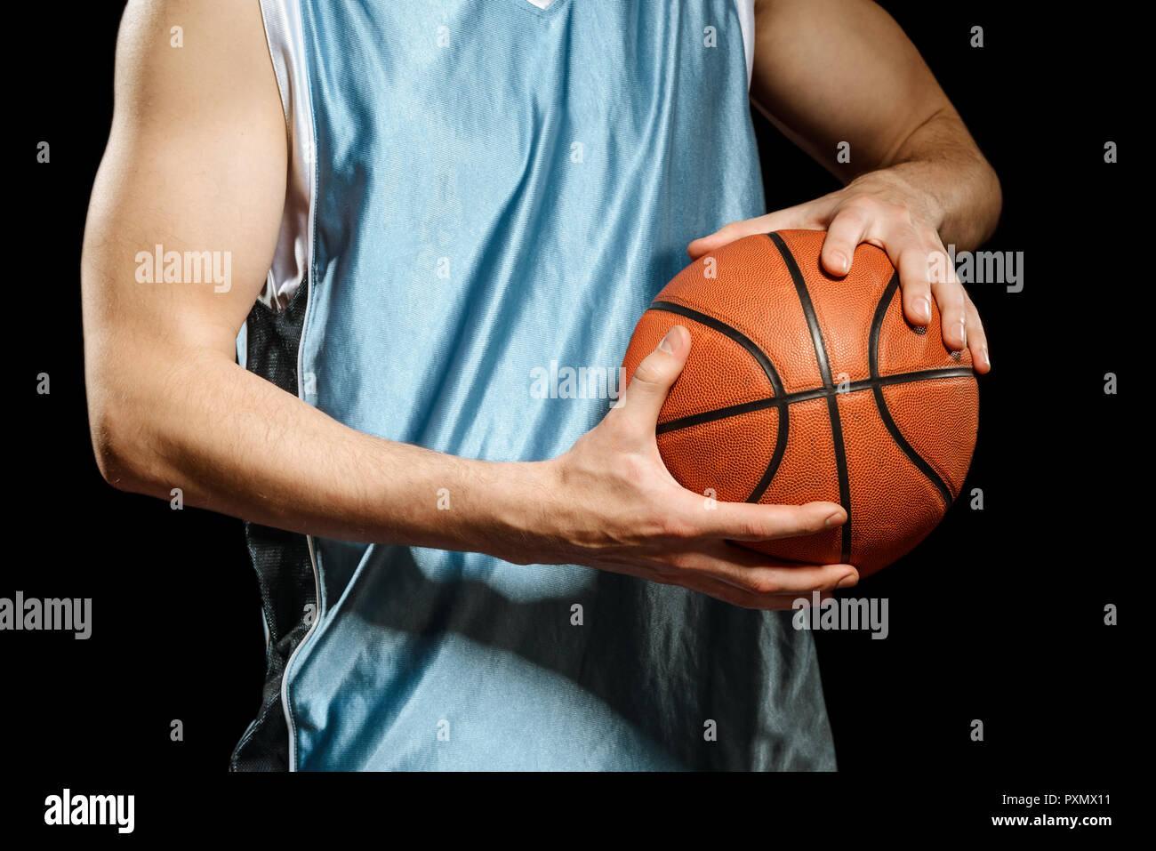 Basketball Spieler mit einem Ball Stockfoto