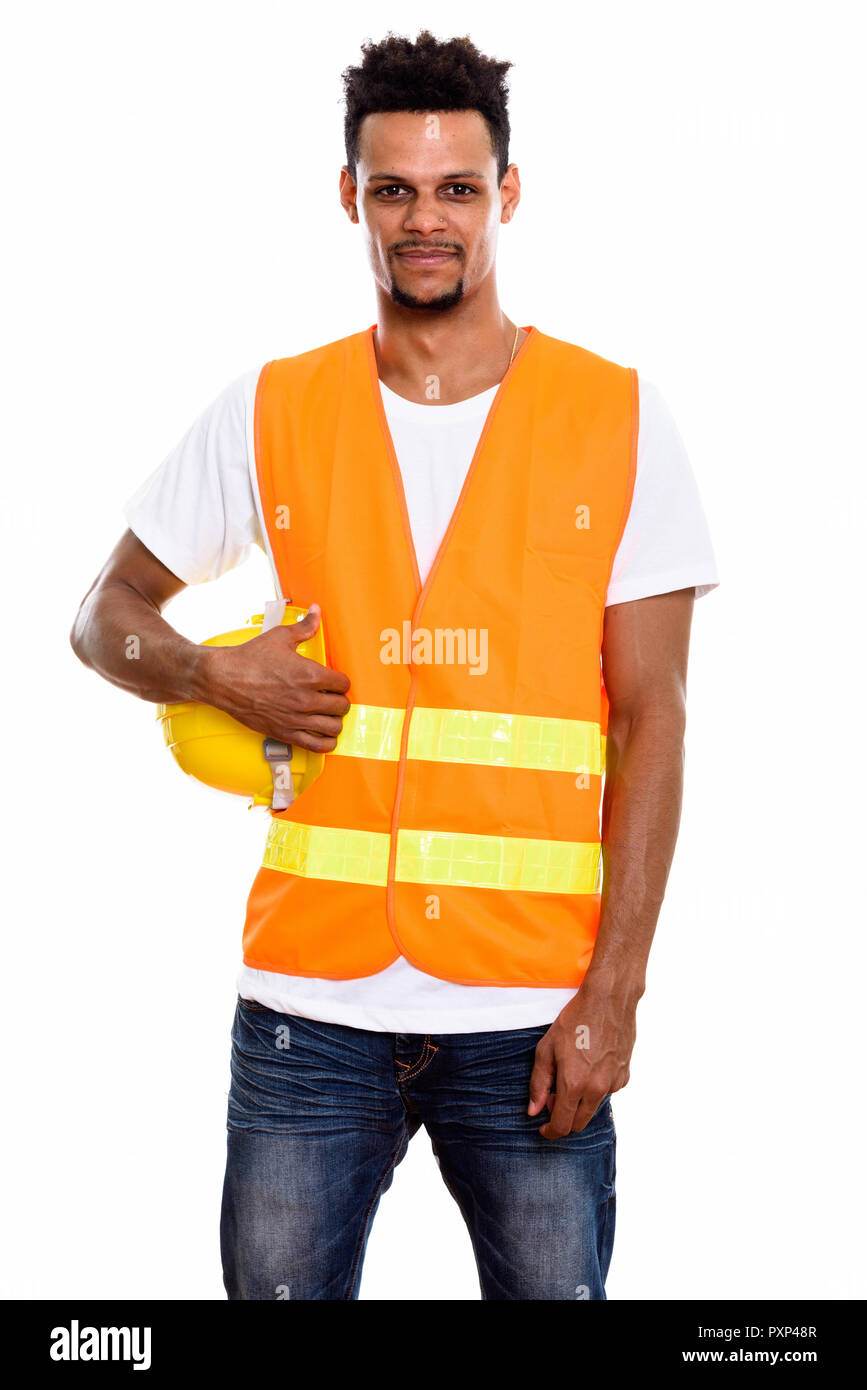 Junge afrikanische Mann Bauarbeiter holding Schutzhelm Stockfoto