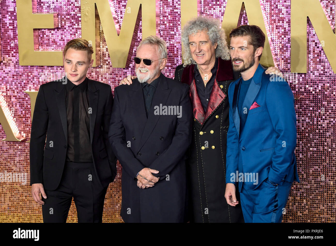 London, Großbritannien. 23. Oktober 2018. Ben Hardy (wer spielt Roger Taylor), Queen's Roger Taylor von Queen Brian May und Gwilym Lee (wer spielt Brian May) kommen für die weltweite Premiere des Films 'Bohemian Rhapsody' an der SSE-Arena in Wembley. Credit: Stephen Chung/Alamy leben Nachrichten Stockfoto