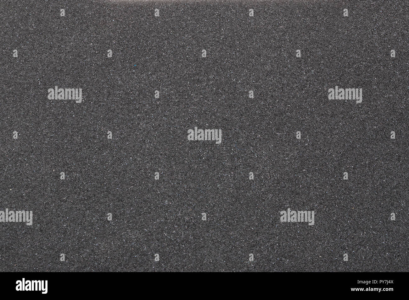 Schwarzer Schaumstoff, Schaumstoff Textur Hintergrund. Stockfoto