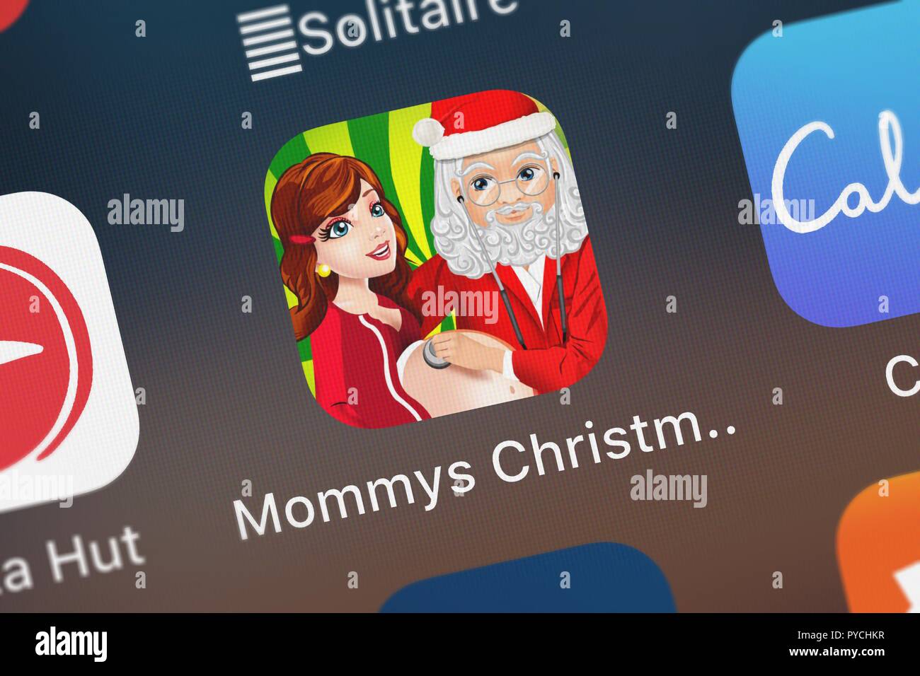 London, Großbritannien, 26. Oktober 2018: Screenshot der mobile App's Mama Christmas Baby Arzt Salon - Mein Santa Spa Make-Up Spiele von VZO Ente Stockfoto