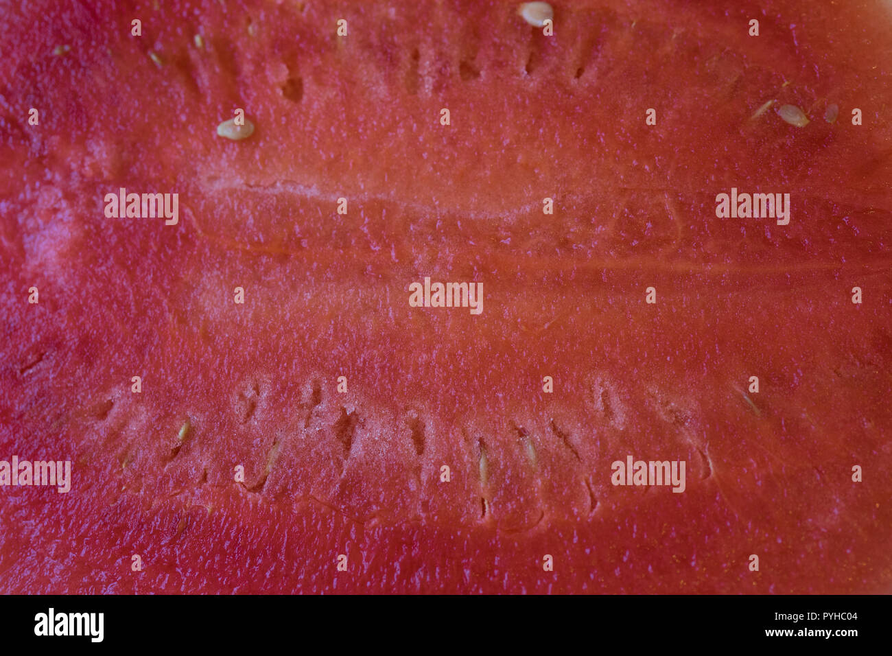 Das rote Fleisch der Wassermelone mit einer kleinen Menge Saatgut mit einer weichen Textur Stockfoto