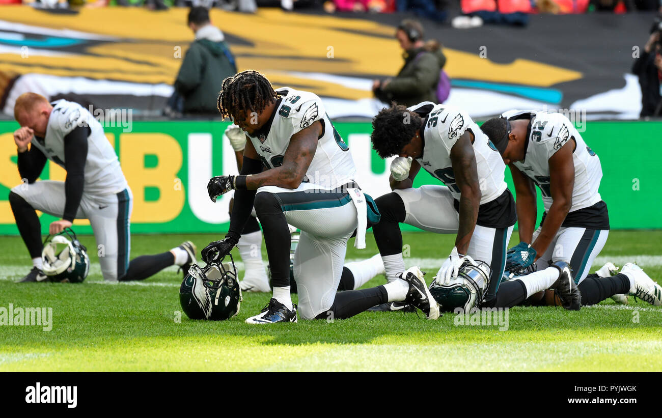 London, Großbritannien. 28. Oktober 2018. Adler Spieler Beten vor dem Kick-off. Philadelphia Eagles an der Jacksonville Jaguars NFL Spiel im Wembley Stadium, das abschließende Spiel in der NFL London 2018 Serie. Credit: Stephen Chung/Alamy leben Nachrichten Stockfoto