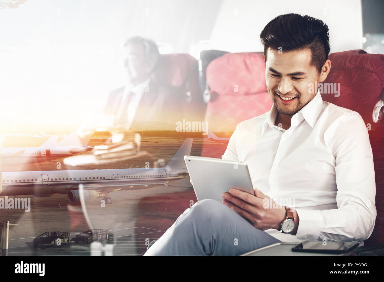 Geschäftsleute mit dem Flugzeug Stockfoto