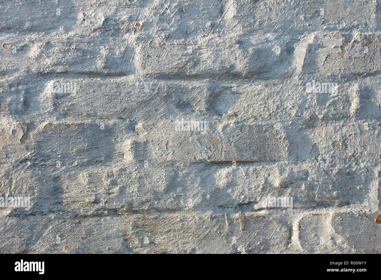 Fragment eines alten gemauerten Wände mit Kalk Stockfoto