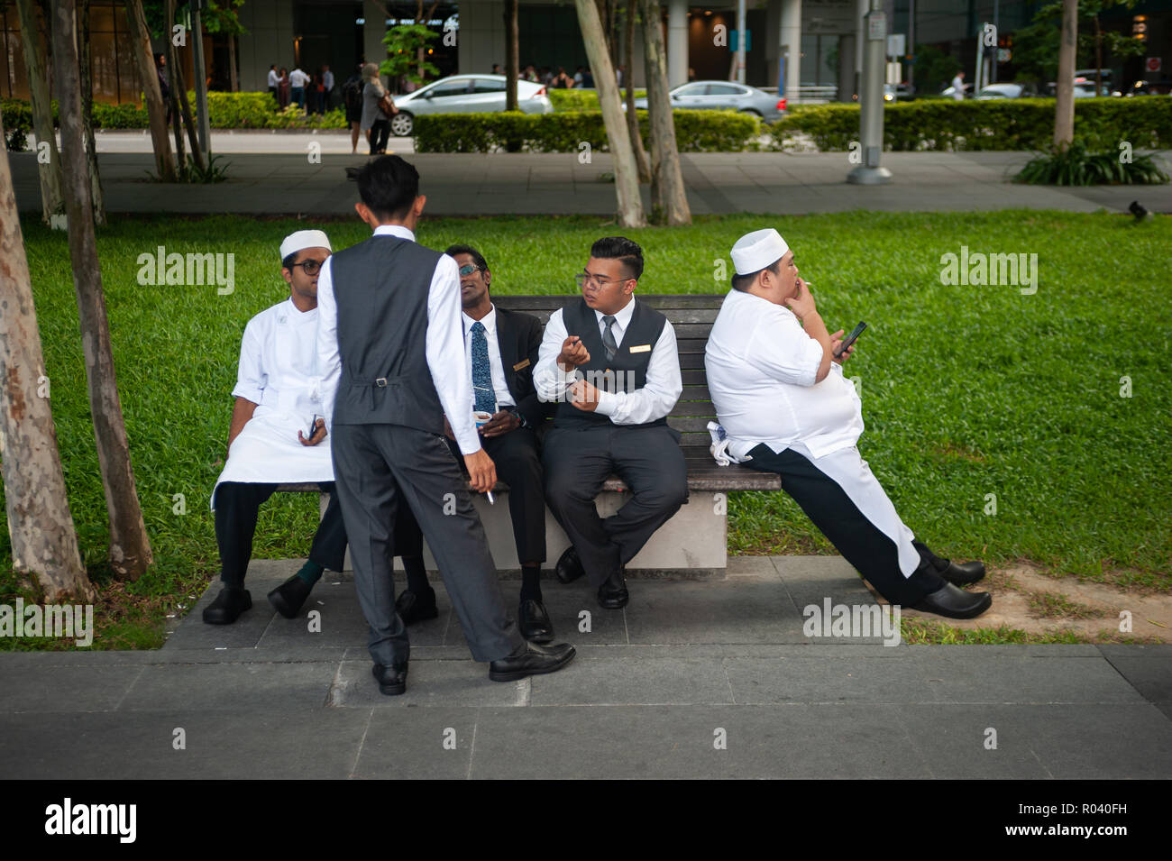 Republik Singapur, Mitarbeiter machen Sie eine Pause in der Marina Bay Stockfoto