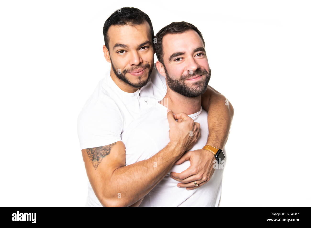 Junge Homosexuelle Homosexuelles Paar lieben einander auf einem weißen Hintergrund. Stockfoto