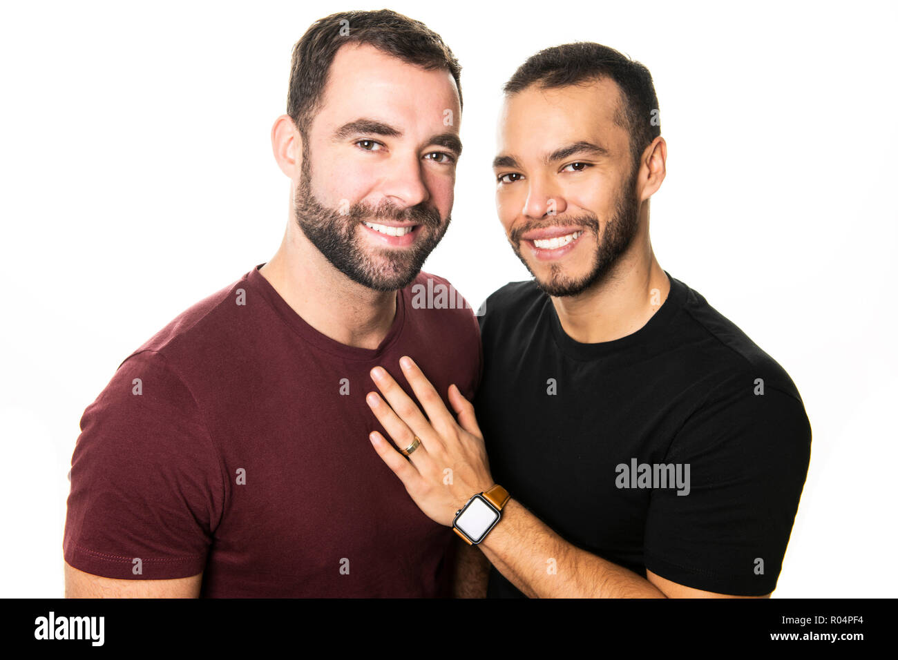 Junge Homosexuelle Homosexuelles Paar lieben einander auf einem weißen Hintergrund. Stockfoto