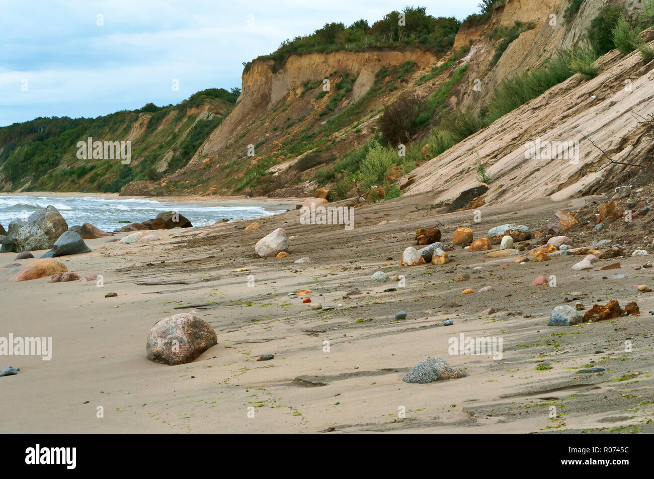 Hohe Küste, die steilen Lehm Sea Shore Stockfoto