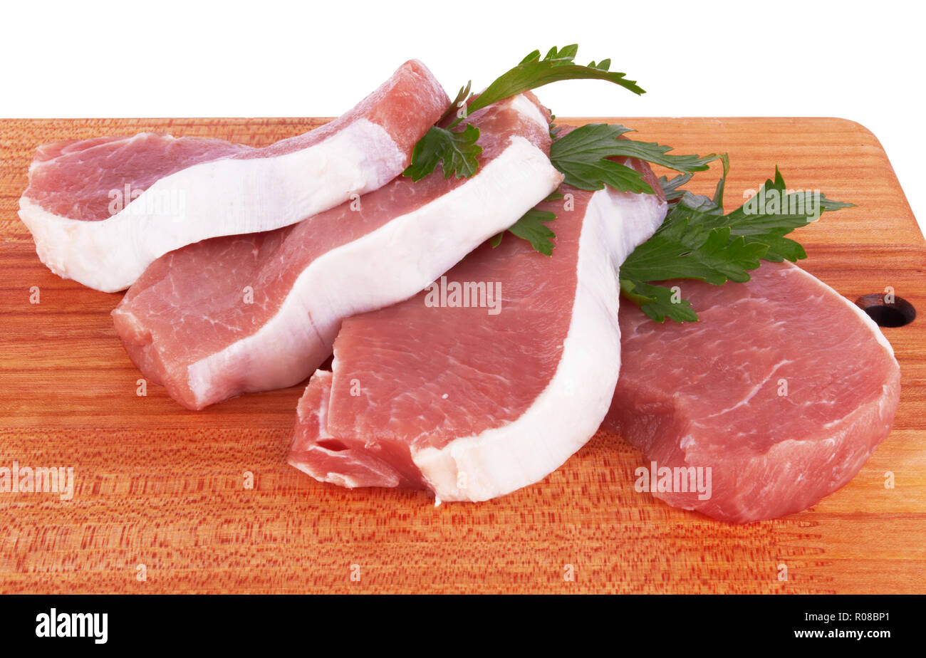 Schneiden von Rindfleisch Steak auf Fleisch Hartfaserplatte. Isoliert. Stockfoto