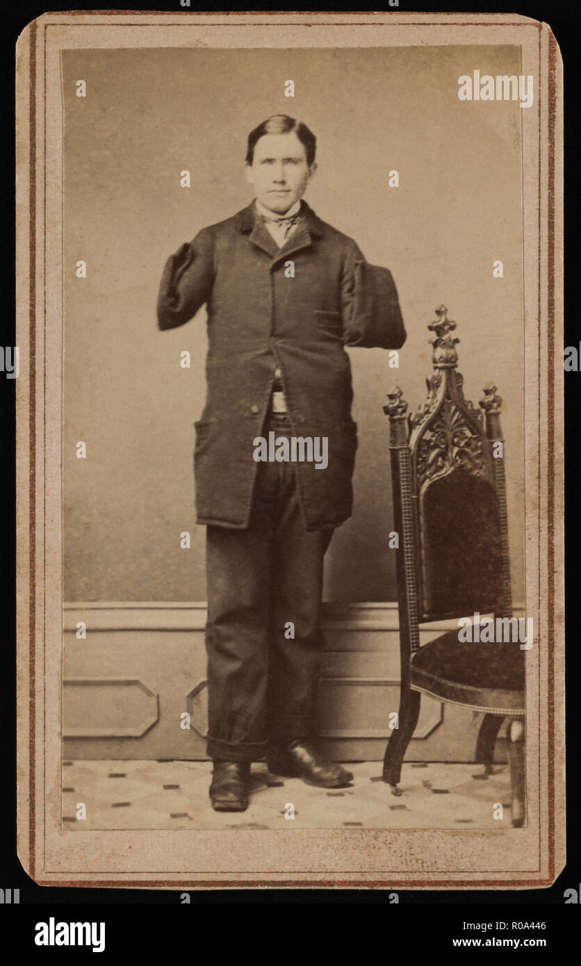Richard D. Dunphy, ehemaliger US-Marine Sailor mit amputierten Arms, war Kohle schwerere an Bord der USS Hartford während des Amerikanischen Bürgerkriegs und wurde verwundet während der Schlacht von Mobile Bay, ausgezeichnet Kongreßehrenmedaille, volle Länge, Porträt, 1864 Stockfoto
