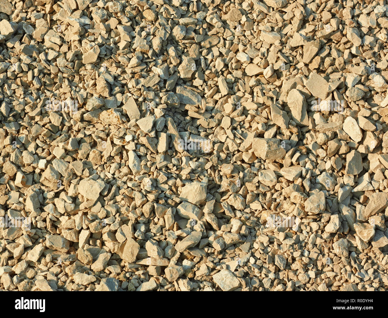 Stein im hellen Sonnenlicht als Textur Stockfoto