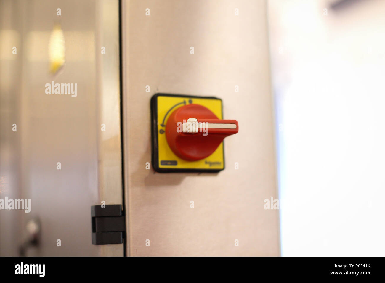 Emergency ON/OFF industrial switch of a food industry equipment. Emergency stop Stockfoto