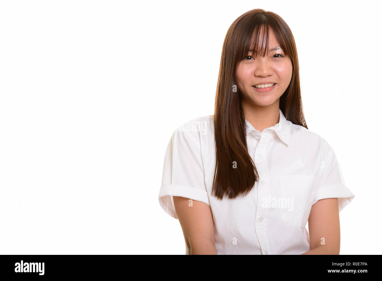 Porträt der jungen glücklich Asiatischen Teenager Mädchen lächelnd Stockfoto