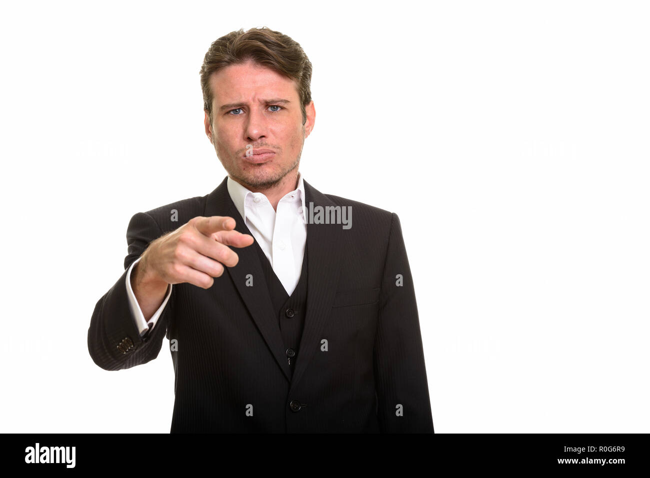 Stattlichen kaukasischen Geschäftsmann zeigenden Finger, während Sie ups Stockfoto