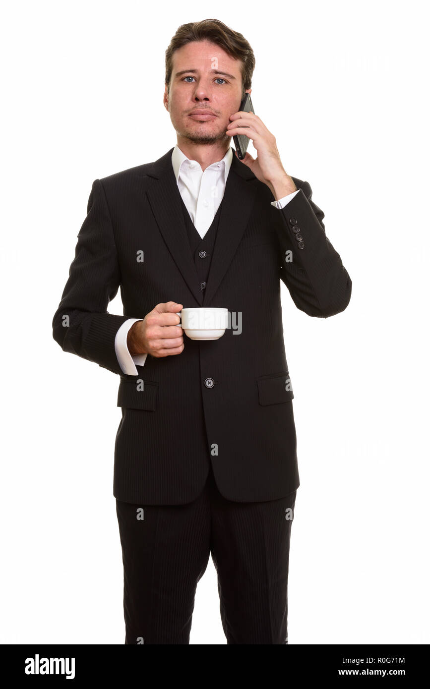 Stattlichen kaukasischen Geschäftsmann Gespräch am Handy während Fei Stockfoto
