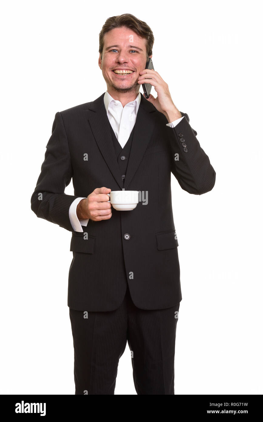 Happy kaukasischen Geschäftsmann Gespräch am Handy während holdin Stockfoto
