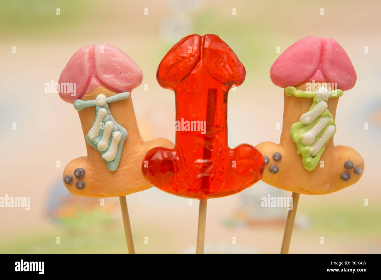 Sex Spielzeug, Sigkeiten, bunten Sigkeiten auf einem Stick  Stockfotografie - Alamy